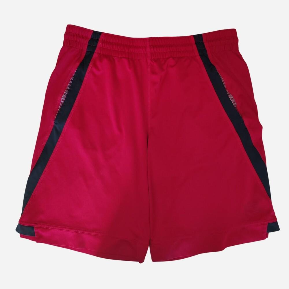 Nike red baggy basketball shorts with black side stripes